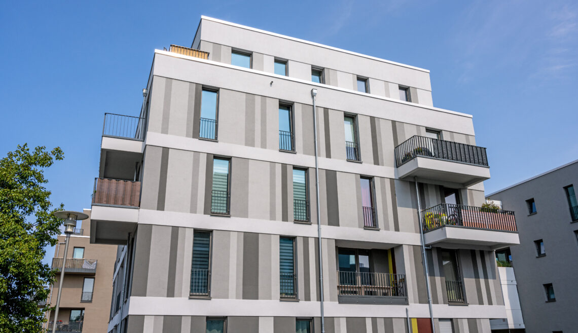 modern-apartment-building-exterior-on-a-sunny-day-2026-09-23-21-32-11-utc
